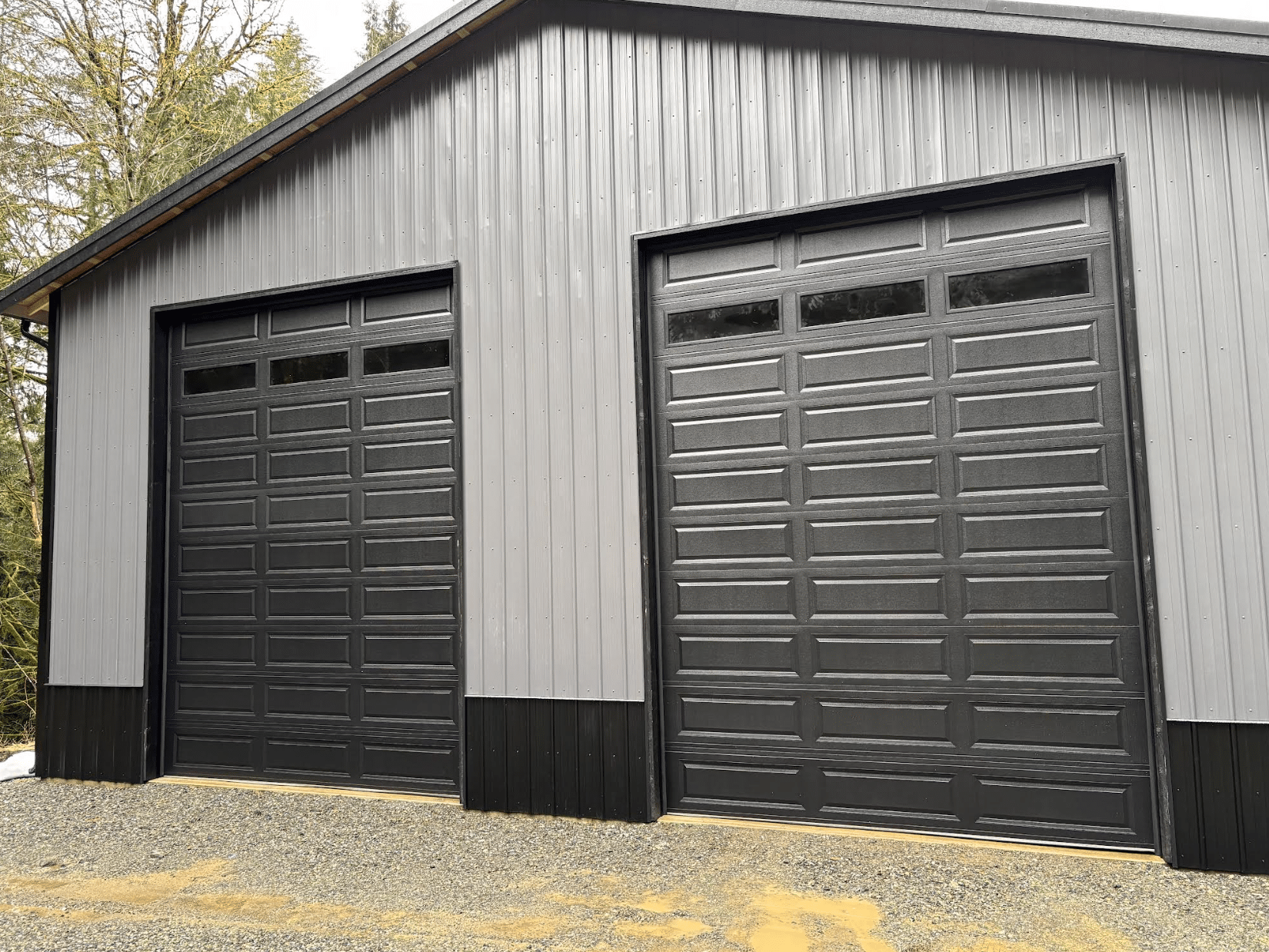 Double tall garage doors installed on an detached garage